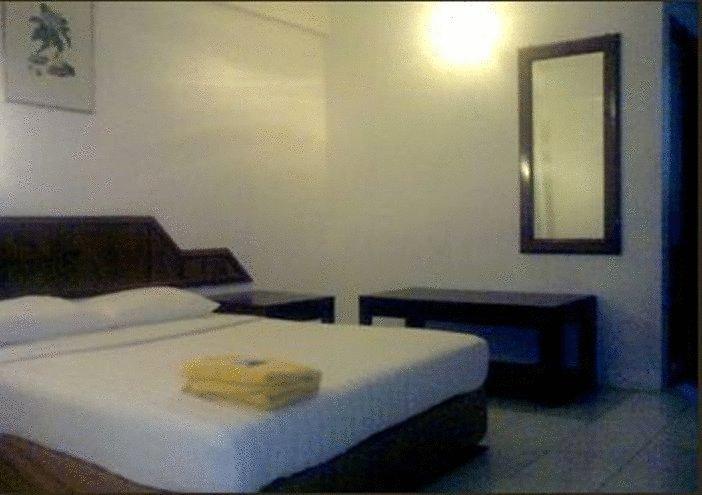 Palace Inn Miri Habitación foto